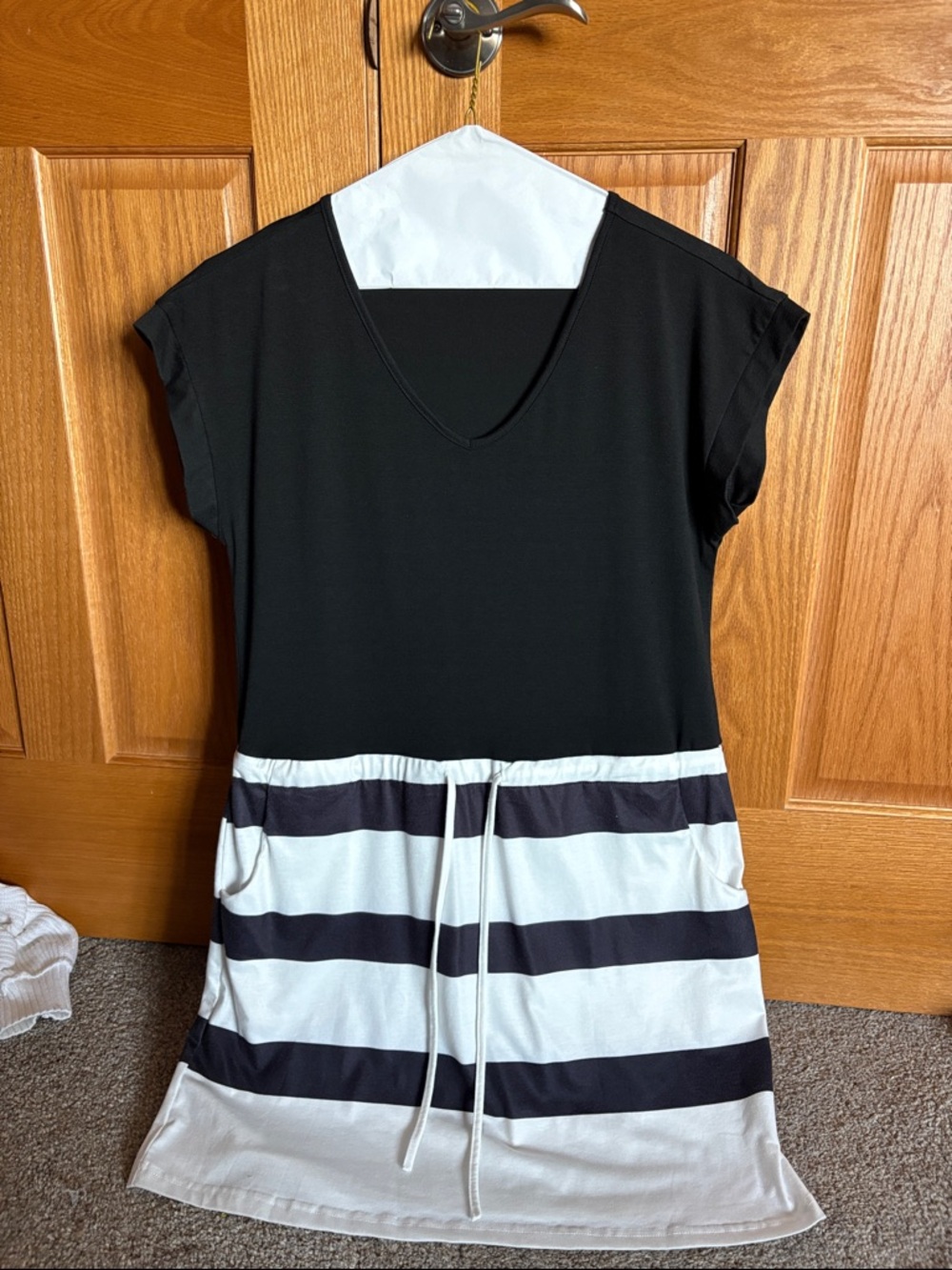 Black V-Neck Dress with White and Black Striped Skirt